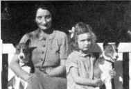 Mrs. Burn and Jennifer Burn with the basenjis Bongo and Bokoto of Blean