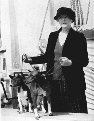 Lady Helen Nutting arriving in England with two of her imported dogs